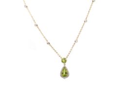 A PERIDOT AND DIAMOND NECKLACE