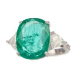 AN EMERALD AND DIAMOND RING