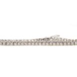 A DIAMOND TENNIS BRACELET