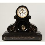 A black marble mantel clock with Escapement Visible movemen