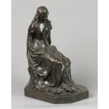 A bronze statue of a seated Madonna.ÊArms and body of Chris