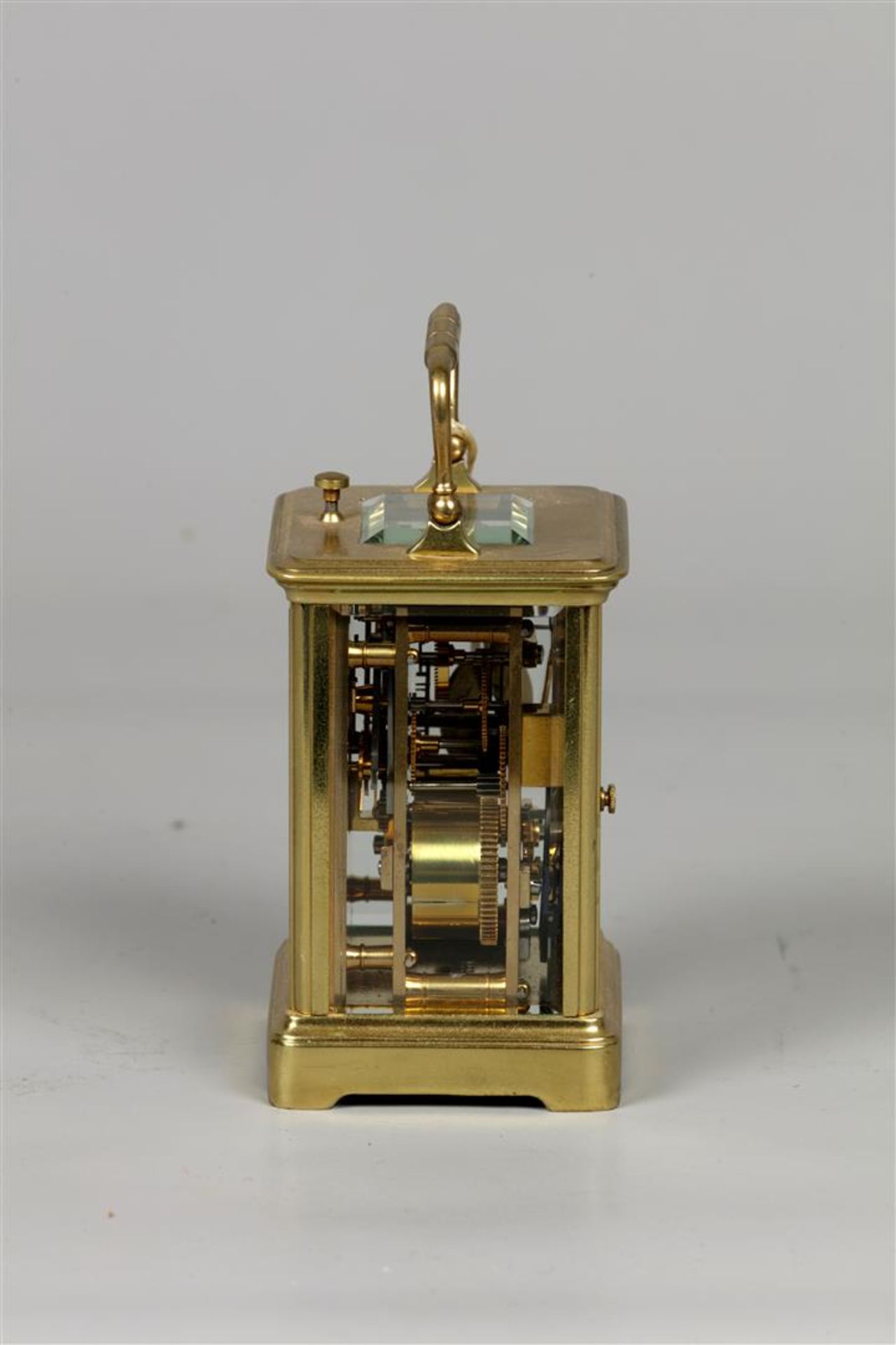 A brass travel alarm clock, white enamel dial shows the hou - Bild 2 aus 3