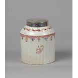 A porcelain ribbed tea caddy with metal lid, New Hall. Engl