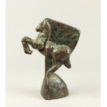 An abstract bronze sculpture of a rearing horse, indistinct