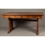 An oak desk flat with three drawers. 20th century.
