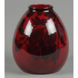 A red glazed vase, marked "Made in Holland". Netherlands, e