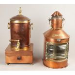 A lot consisting of a copper ship lamp and a tap jug.