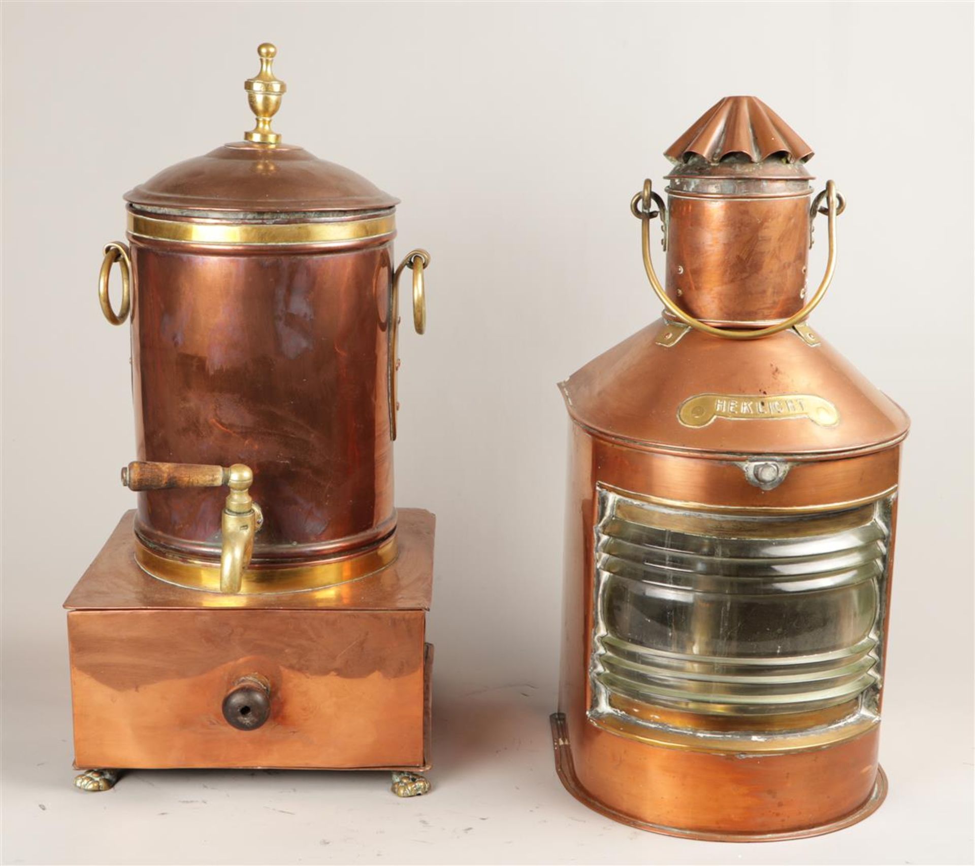 A lot consisting of a copper ship lamp and a tap jug.