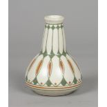 An earthenware vase with a line decoration all around, desi