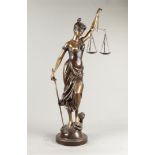A bronze Lady Justice patinated in various colours. Second
