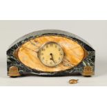 A green marble mantel clock with bronze ornaments. France,