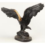 A bronze statue of a condor with wings spread. 2nd half of