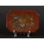 A bronze red lacquer dish 8-sided with gilded floral decora