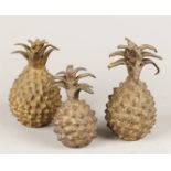 A set of (3) decorative bronze pineapples. 2nd half 20th century.