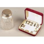 A lot consisting of a glass cannister with silver lid on wh