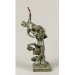 A green patinated bronze statue based on the original by Gi