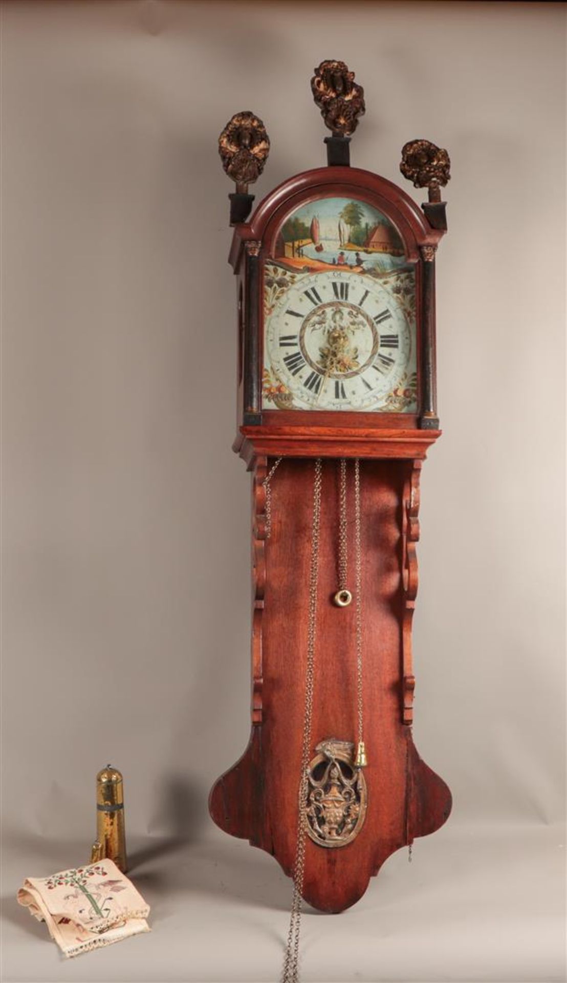 A "Frisian" hanging clock with alarm function.