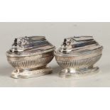 A set of (2) silver plated ronson Queen Anne style table li