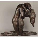 A dark patinated bronze group of a mating couple. 2nd half