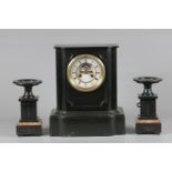 A black marble clock set with "Ancre visible" movement. Fra