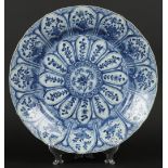 A porcelain dish with floral decor in divisions. China, Kan