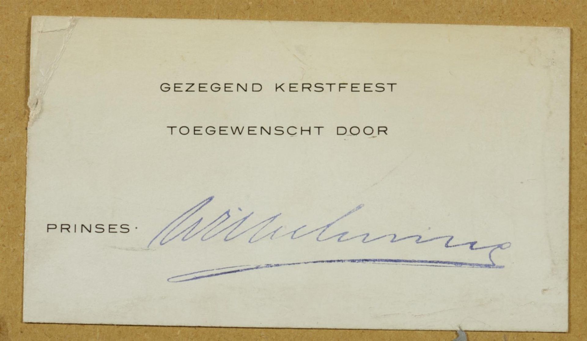 A framed postcard with a signature of HRH Princess Wilhelmi