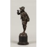 A bronze sculpture of a smoker. ca 1900. H.: 30 cm. incl. s