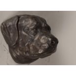 A bronze dog's head. 2nd half of the 20th century. H.: 22 c