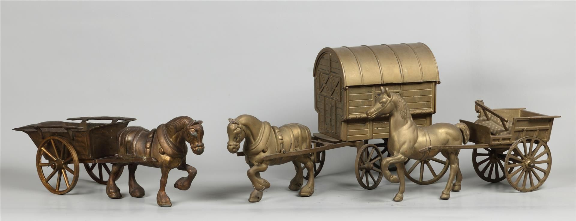 A lot consisting of (3) large brass / brass horse and carri