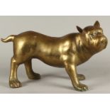 A brass statue of a dog. 2nd half of the 20th century. H.: