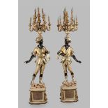 A set of wooden polychrome blackamoor statues with lamp. 2n