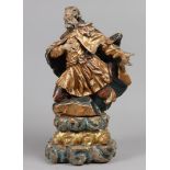 A polychrome and gilded basswood statue of a Saint. Germany