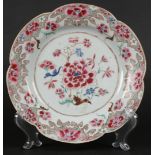 A porcelain lobed famille Rose plate with floral decoration