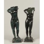 A lot consisting of two dark patinated bronzes depicting a