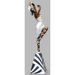 A very large bronze cold-painted sculpture of a dancer on a