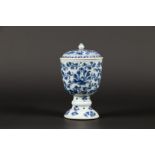 A porcelain Chine de commande wine lidded cup with floral d