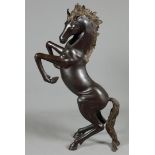 A brown patinated bronze of a rearing horse, second half 20