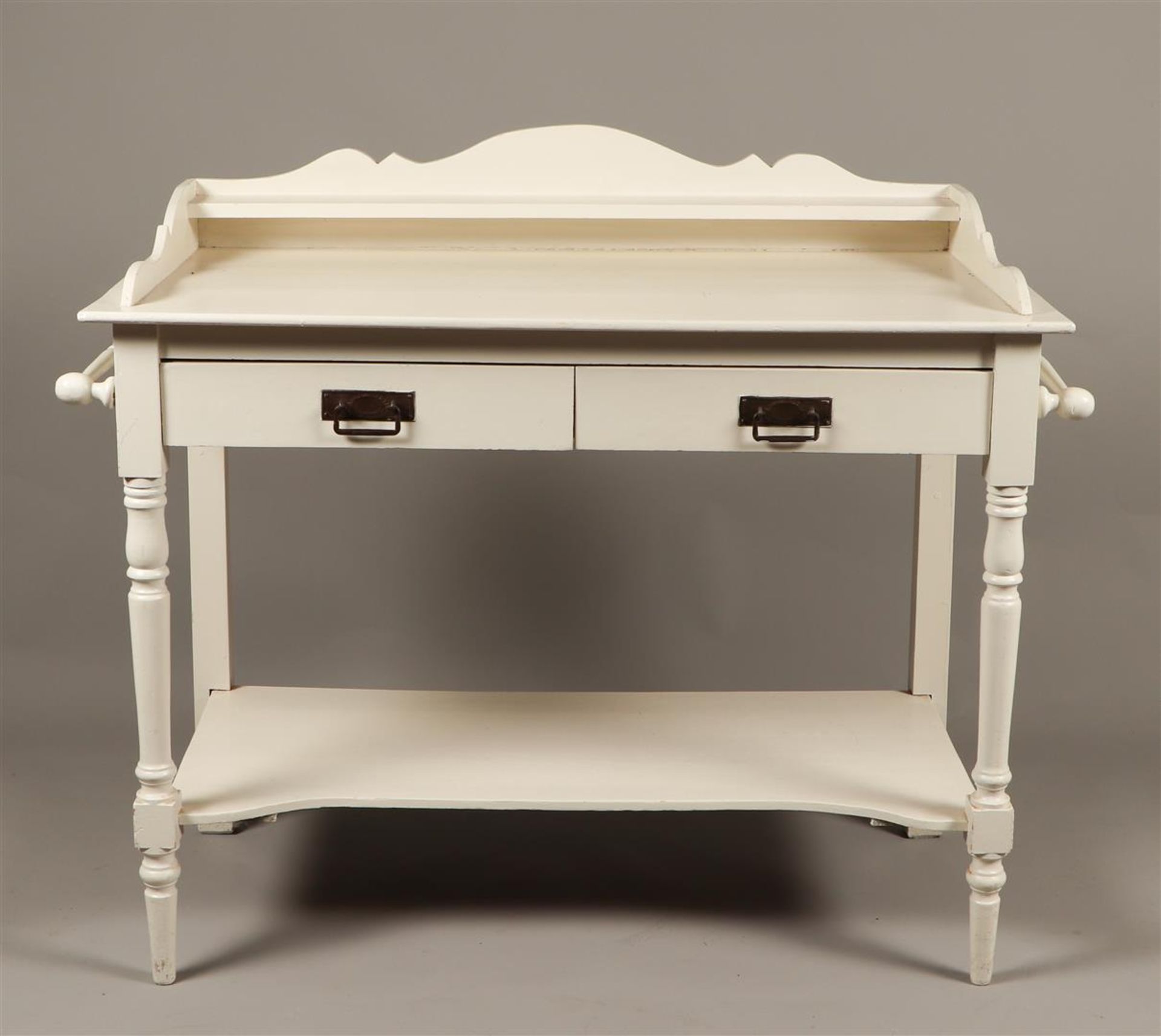 A white lacquered Art Nouvau washbasin furniture.