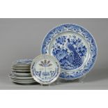 A lot of earthenware plates with various representations, a