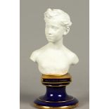 A biscuit bust on a porcelain base "S.A. Le Prince Imperial