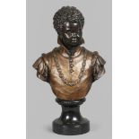 A two-tone patinated bronze bust of a black boy in 17th cen