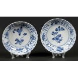 A set of deep porcelain plates with antiquities decor in bo