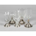 A lot consisting of (5) various glasses on a silver base.
