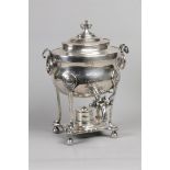 A silver plated bouilloire decorated with lion heads. Franc