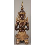 A bronze sculpture of a kneeling temple guard. 2nd half of