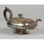 A silver teapot with wooden handle and knob, Bonebakker & S