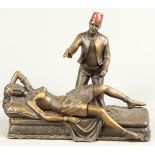 A replica "Viennese" bronze of a fakir and a harem lady. 2n
