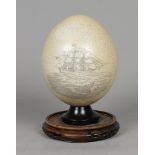 An ostrich egg on foot, depicting a whaler. (replica) 20th