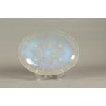 An opalescent bowl with berry decor, marked Julien France.
