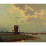 20e eeuw. Hollandse School A windmill in a poldelandscape